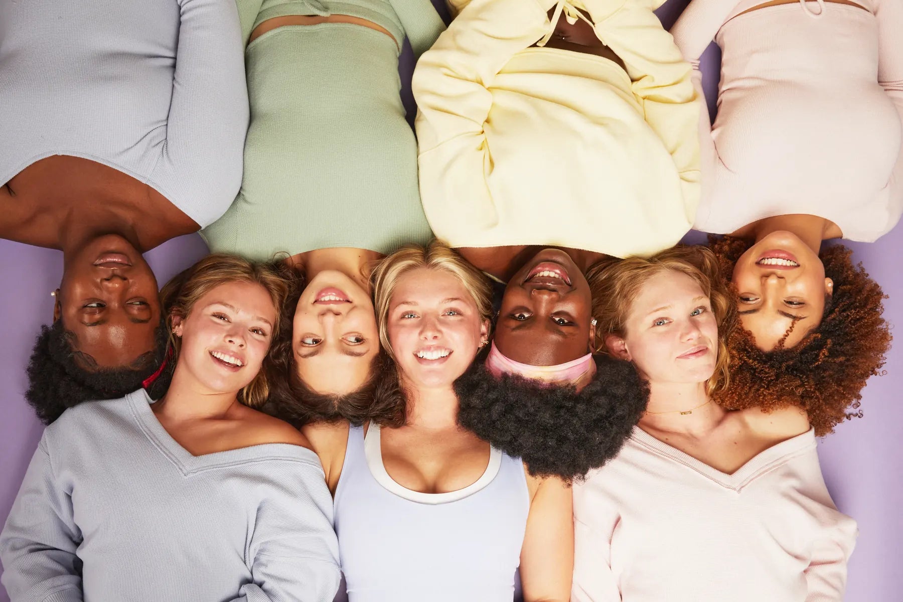 Inclū community lying together in a circle